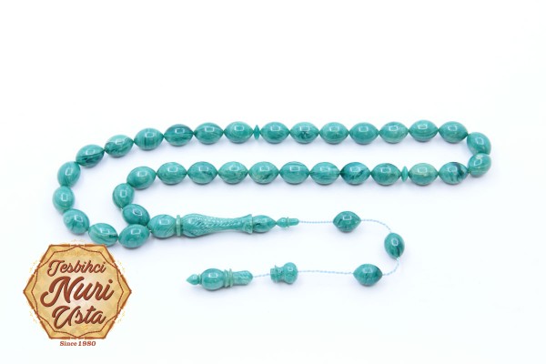 TURKUAZ RENK ATEŞ KEHRİBARI KALEMKAR İMAME ELİPS KESİM SİSTEMLİ PÜSKÜL EL YAPIMI TESBİH